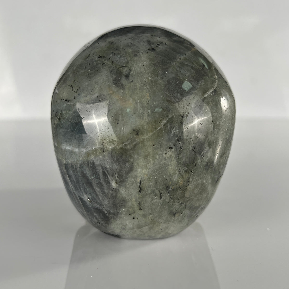 Back view of a 4.5-inch Grey Labradorite human skull carving