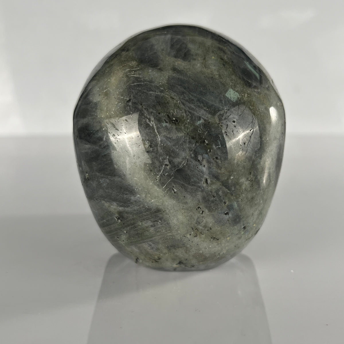 Back view of a 4.5-inch Grey Labradorite human skull carving