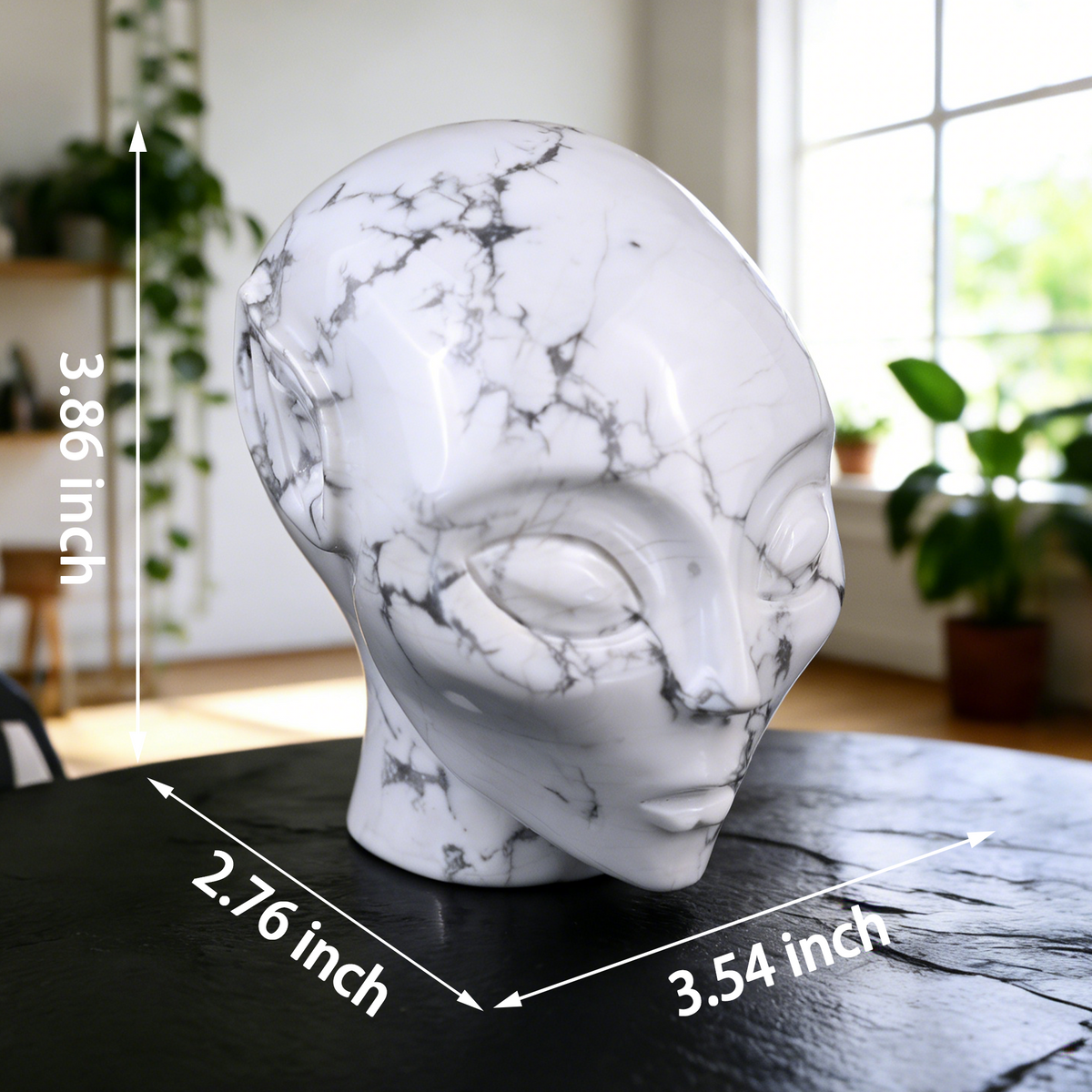 Additional view of a 3.8-inch Howlite alien skull carving