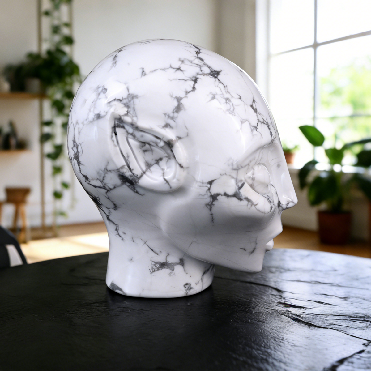 Additional view of a 3.8-inch Howlite alien skull carving