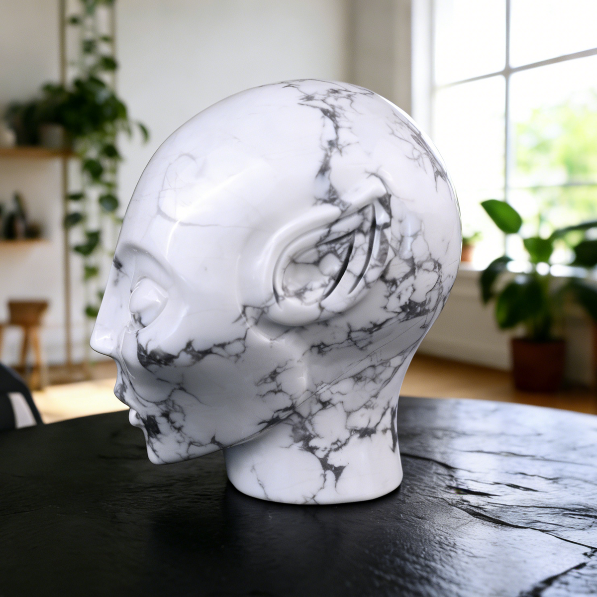 Additional view of a 3.8-inch Howlite alien skull carving