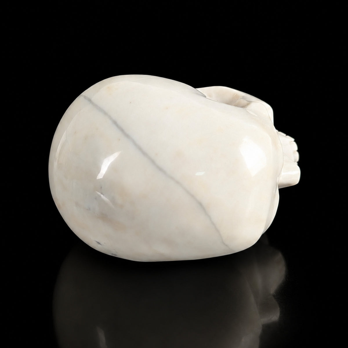 Top view of a 4.5-inch Ivory Jade human skull carving