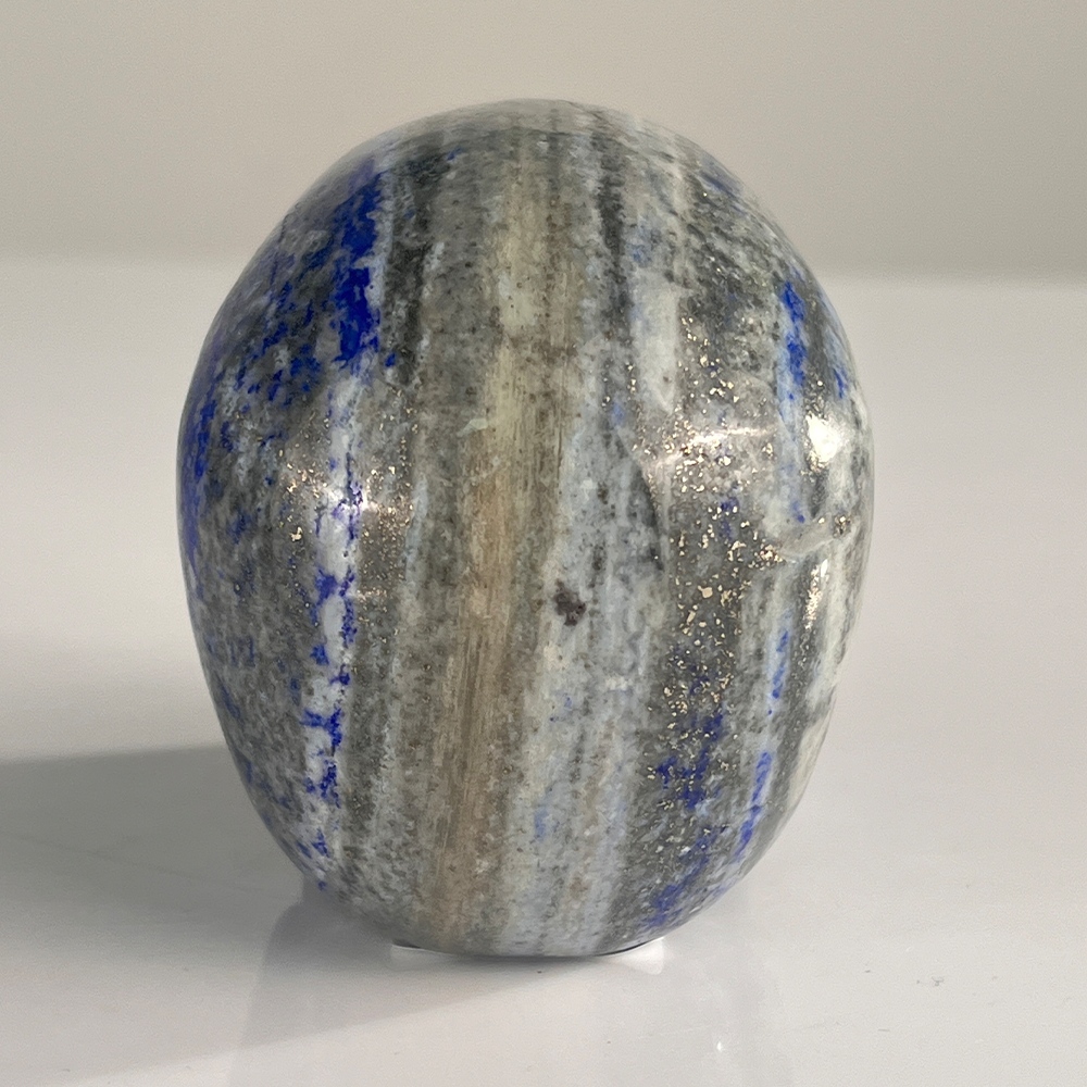 Back view of a 3-inch Lapis Lazuli human skull carving