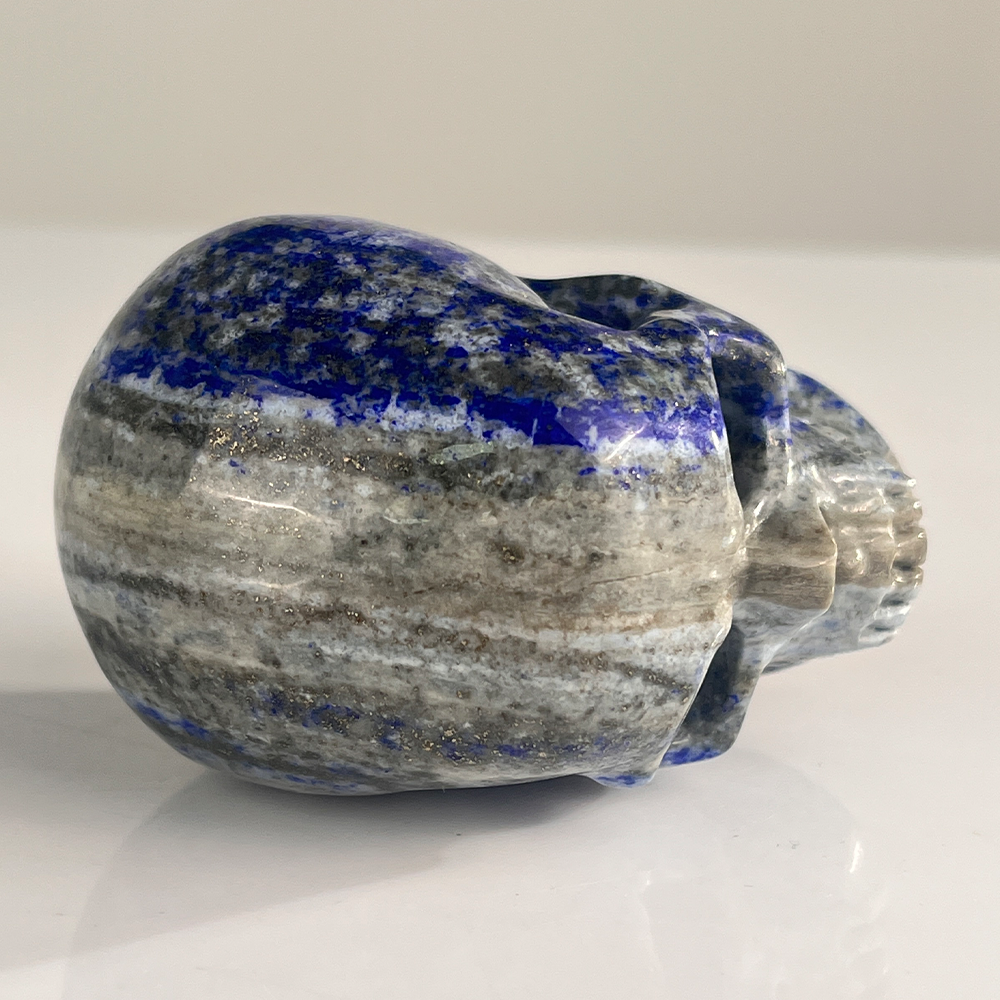 Top view of a 3-inch Lapis Lazuli human skull carving