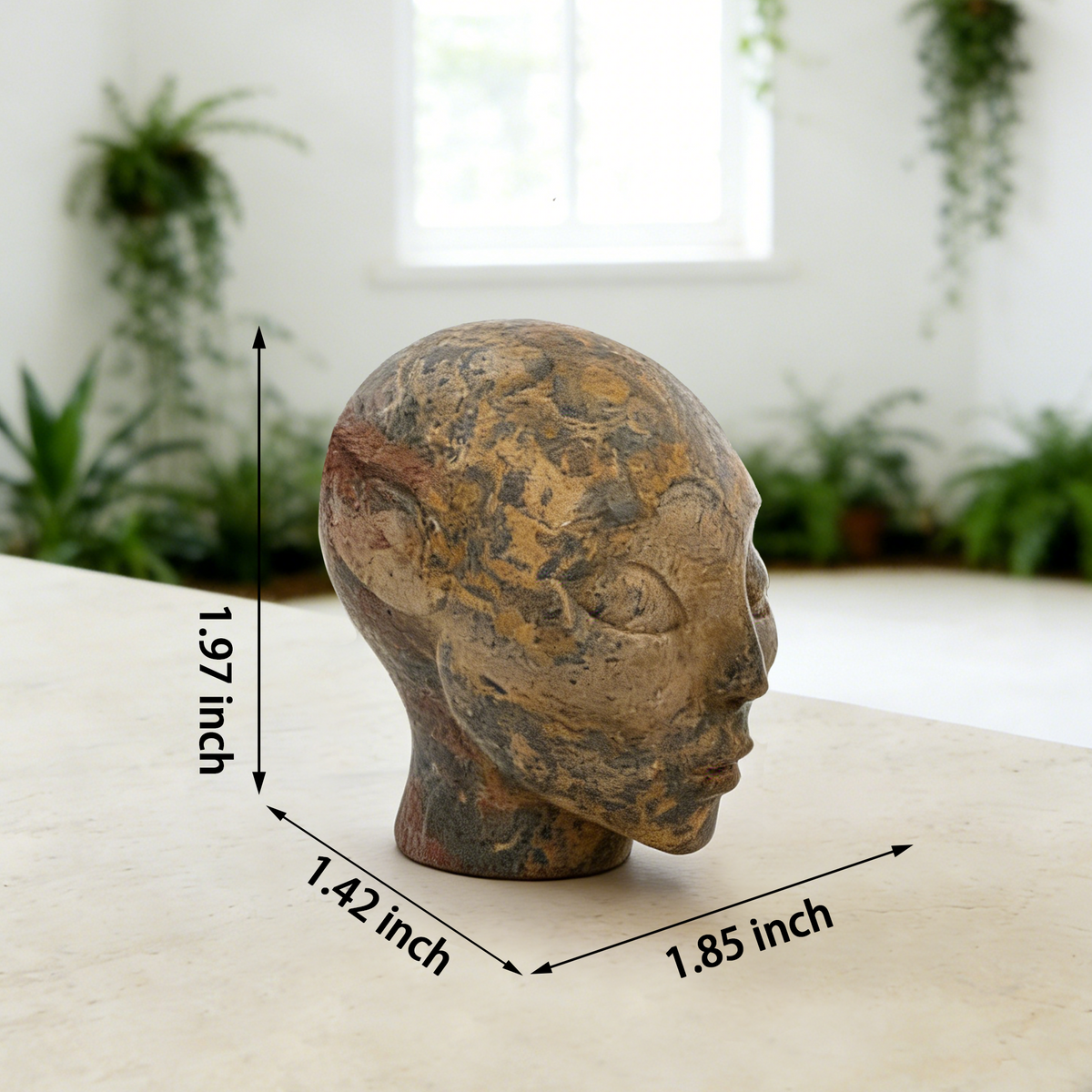 Additional view of a 2-inch Leopard Skin Jasper alien skull carving