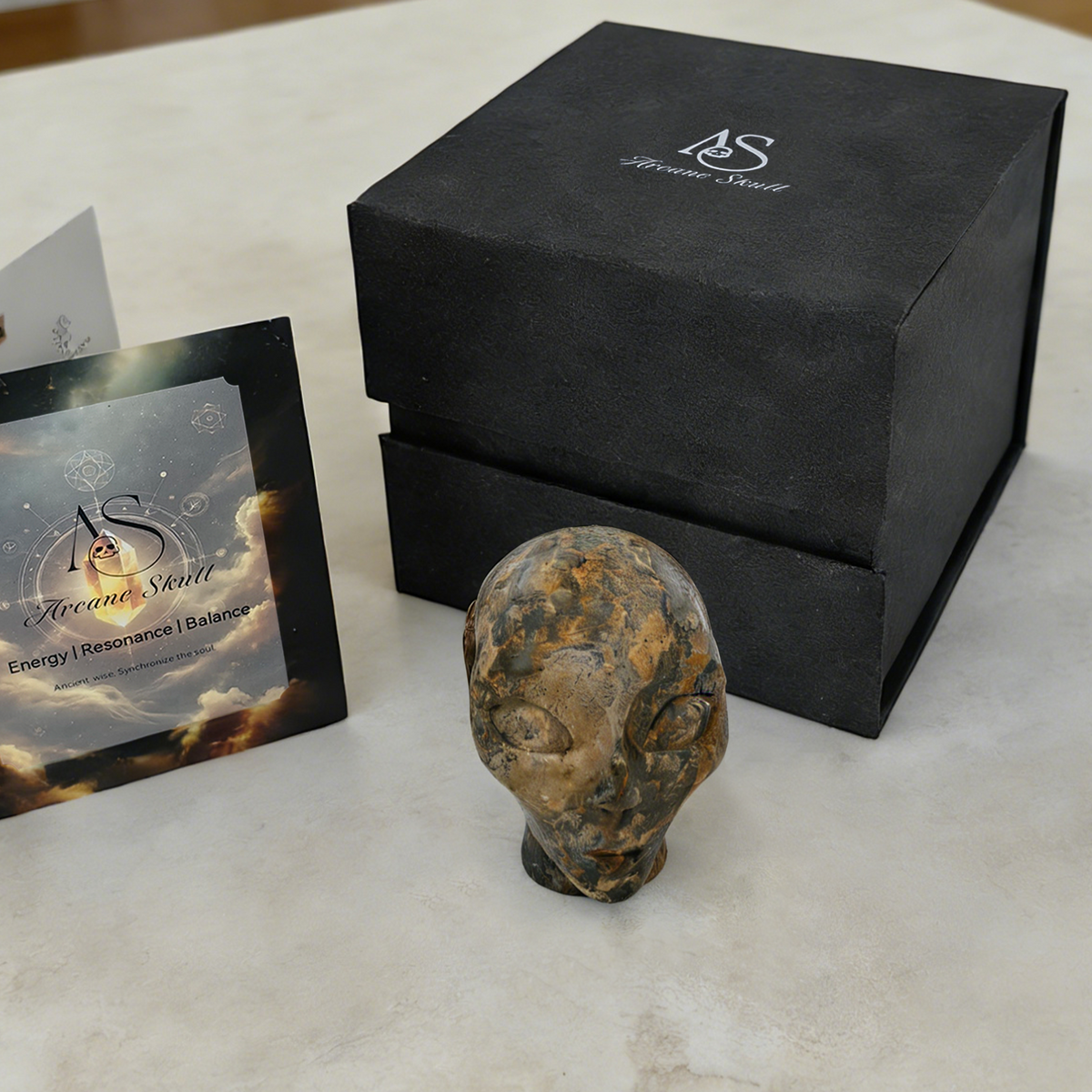 Additional view of a 2-inch Leopard Skin Jasper alien skull carving