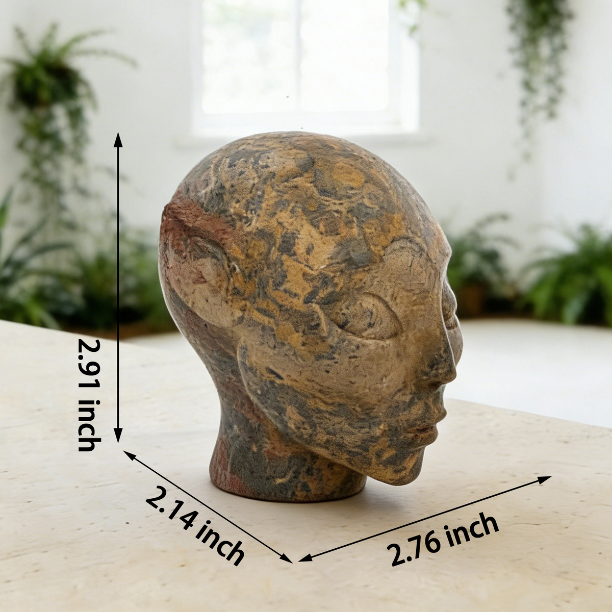 Additional view of a 3-inch Leopard Skin Jasper alien skull carving