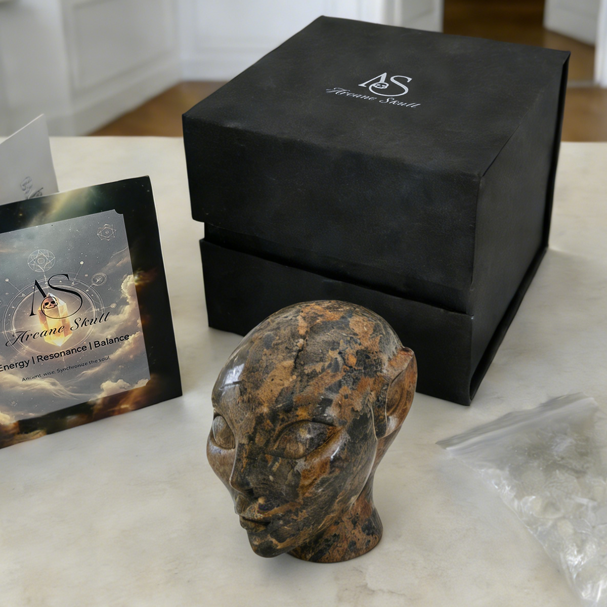 Additional view of a 3-inch Leopard Skin Jasper alien skull carving