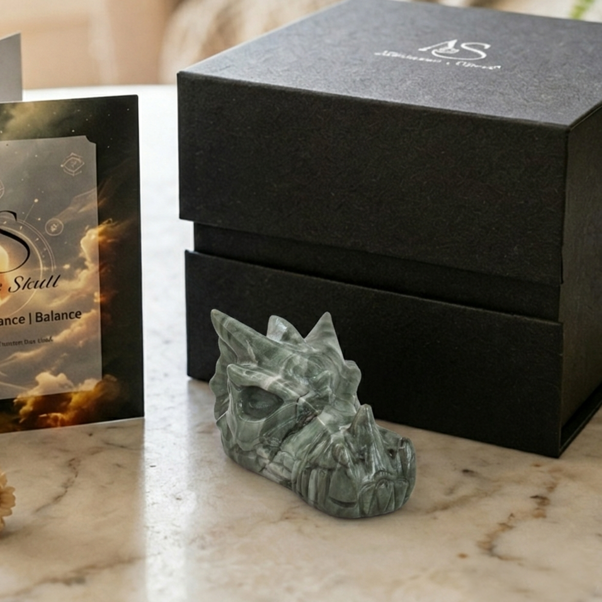 Additional view of a 2.5-inch Nine Dragon Jade dragon skull carving
