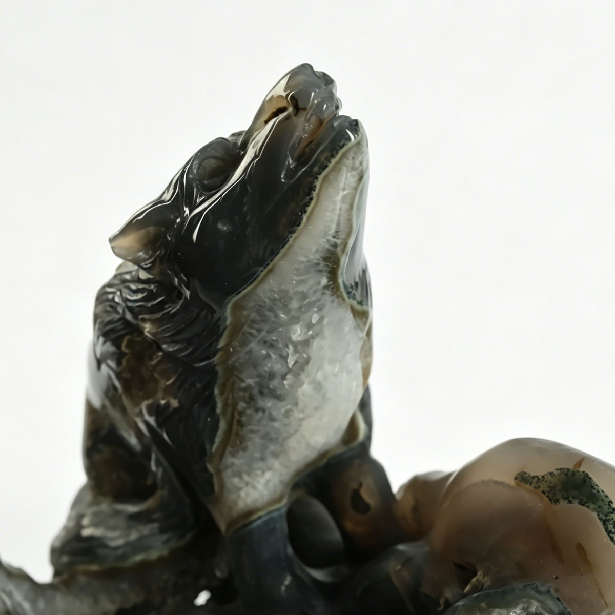 Additional view of a one-of-a-kind Agate geode wolf carving