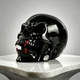 Additional view of a one-of-a-kind Black Obsidian and Red Jasper fanged skull carving
