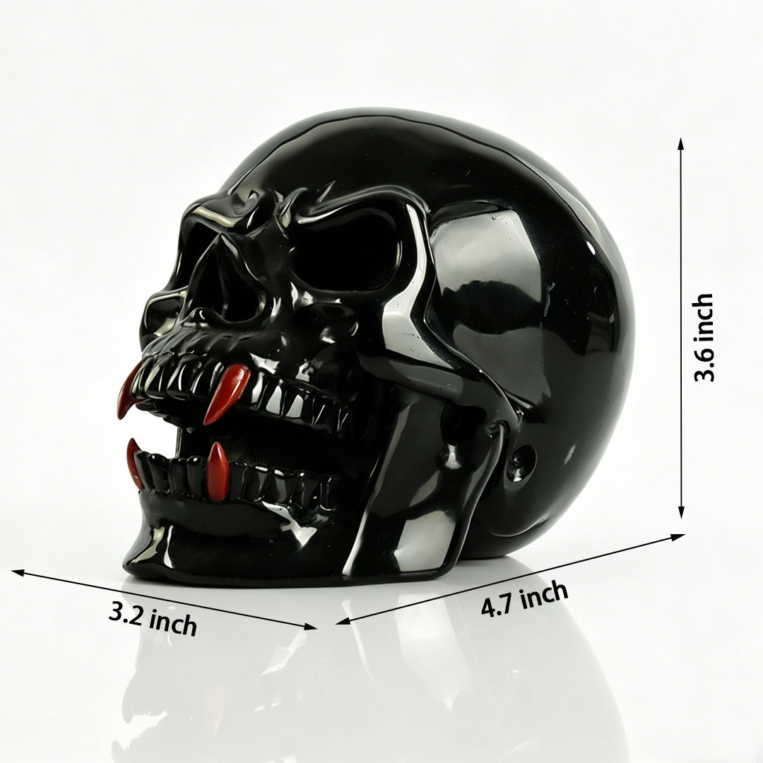 Additional view of a one-of-a-kind Black Obsidian and Red Jasper fanged skull carving
