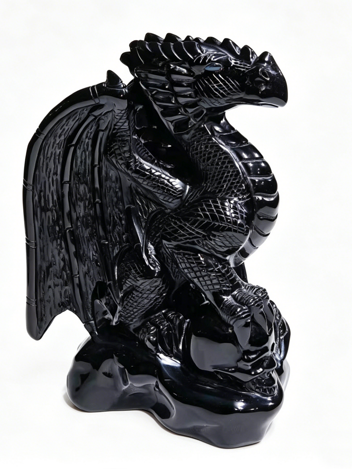 Additional view of a one-of-a-kind Black Obsidian skull and winged dragon sculpture