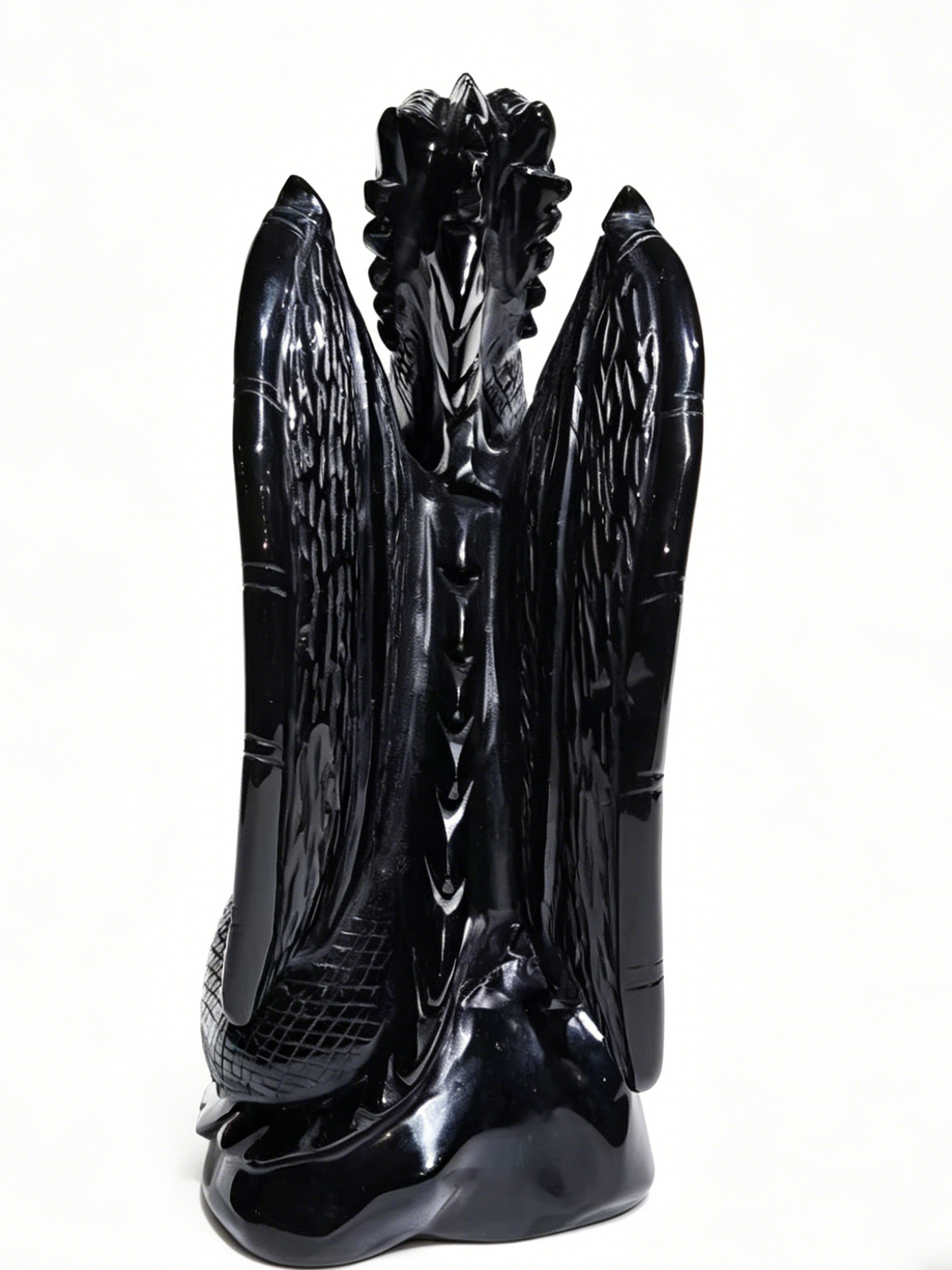 Additional view of a one-of-a-kind Black Obsidian skull and winged dragon sculpture