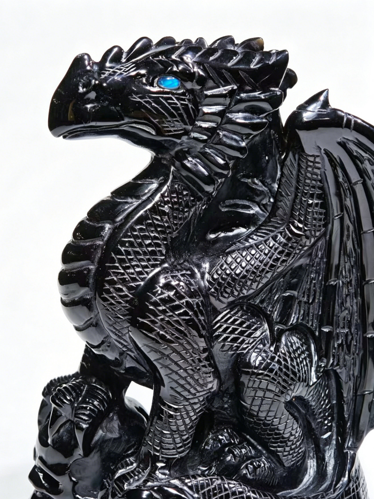 Additional view of a one-of-a-kind Black Obsidian skull and winged dragon sculpture