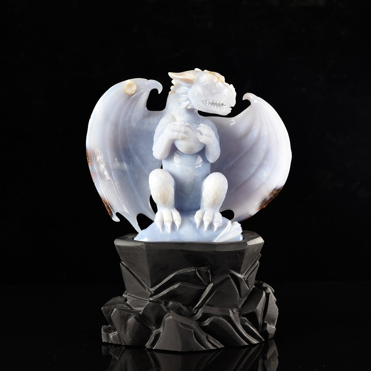 Front view of a one-of-a-kind Blue Chalcedony dragon with egg and hatching dragon sculpture