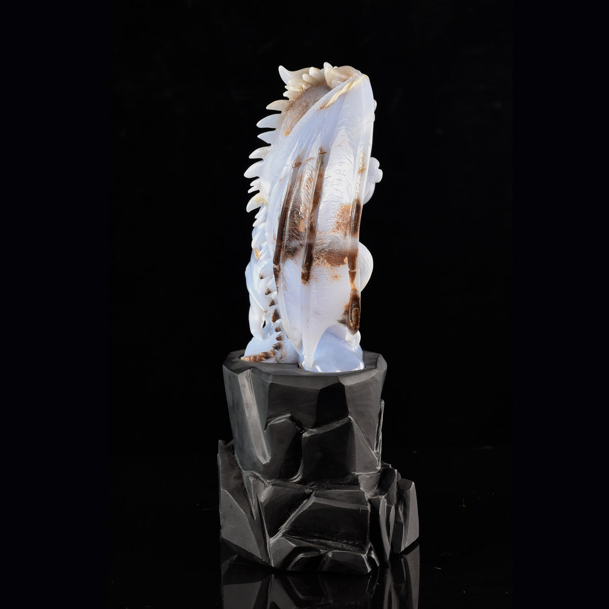 Left view of a one-of-a-kind Blue Chalcedony dragon with egg and hatching dragon sculpture