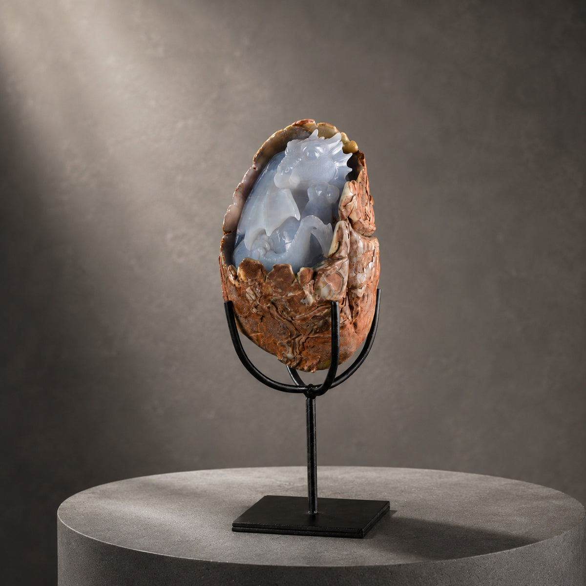 Main view of a one-of-a-kind Blue Chalcedony hatching dragon sculpture