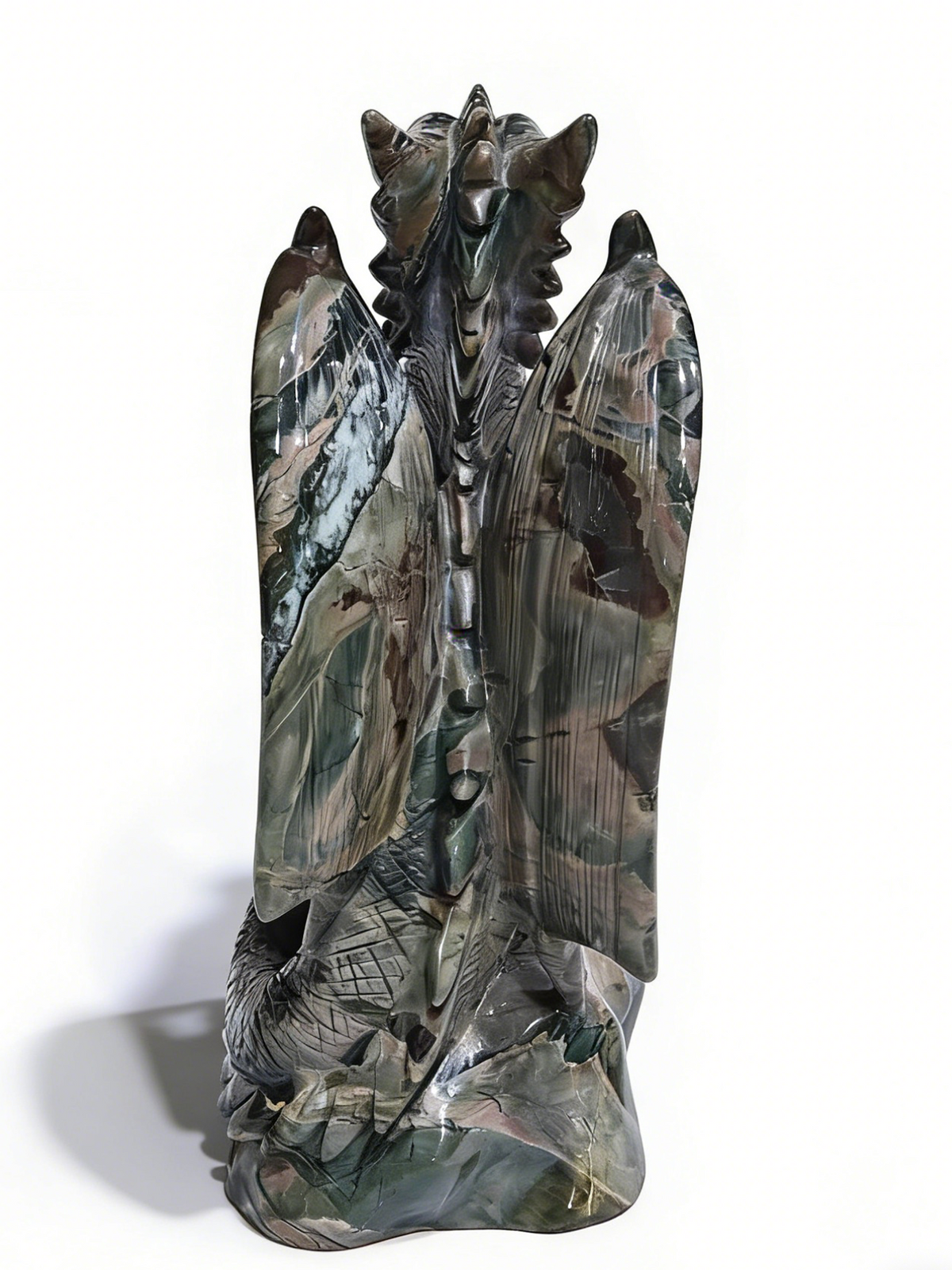 Additional view of a one-of-a-kind Nine Dragon Jade skull and winged dragon sculpture