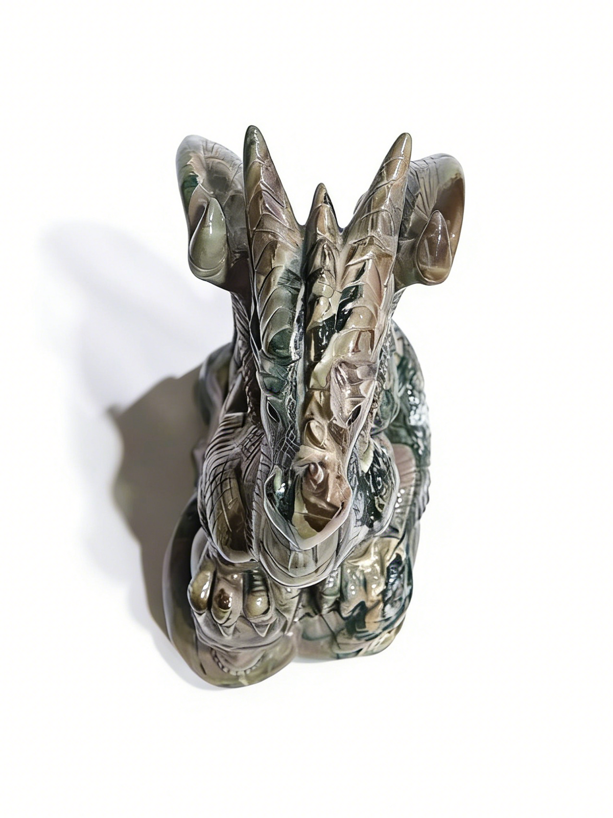 Additional view of a one-of-a-kind Nine Dragon Jade skull and winged dragon sculpture