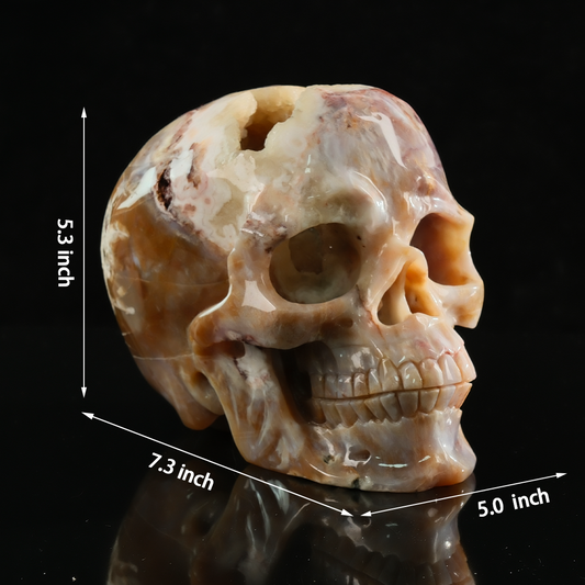Additional view of a one-of-a-kind Yellow Chalcedony geode skull carving