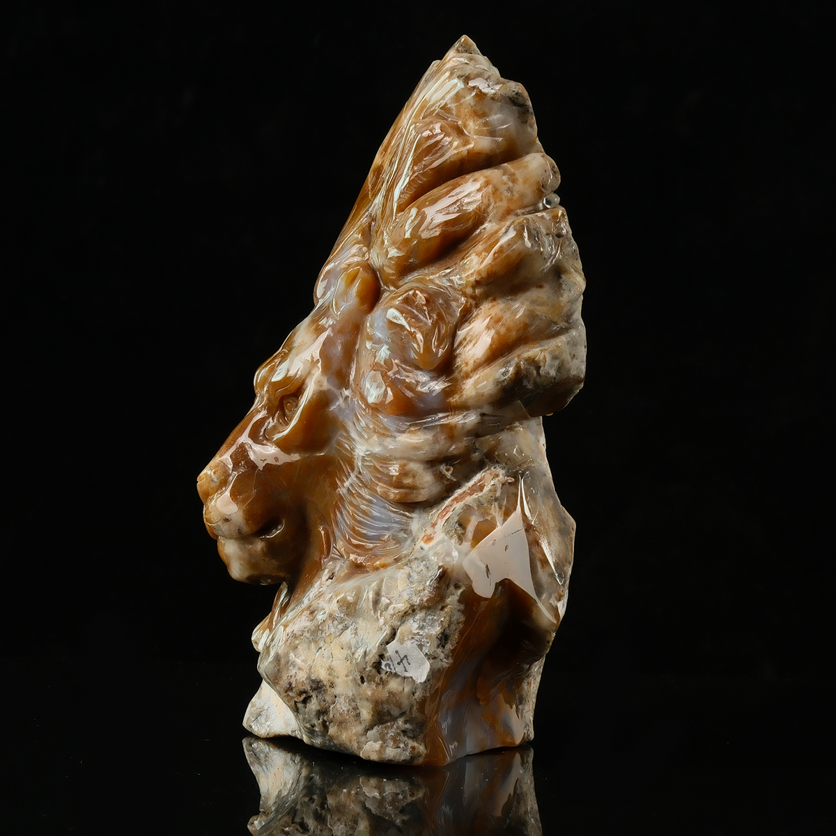 Additional view of a one-of-a-kind Yellow Chalcedony lion-head carving
