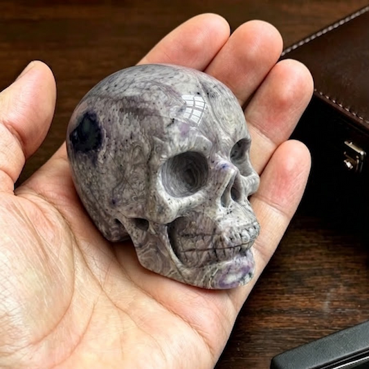 Main view of a 2-inch Purple Peacock Stone human skull carving