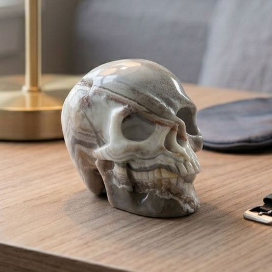 Main view of a 3-inch Red Crazy Lace Agate human skull carving