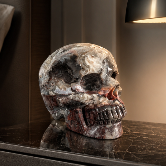 Main view of a 4.5-inch Red Crazy Lace Agate human skull carving