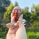 Additional view of a 2-inch Red Jasper alien skull carving