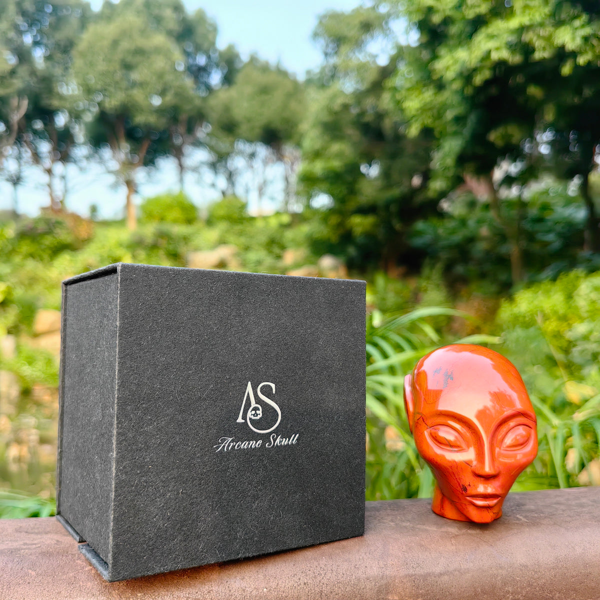 Additional view of a 2-inch Red Jasper alien skull carving