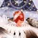 Additional view of a 3-inch Red Jasper alien skull carving