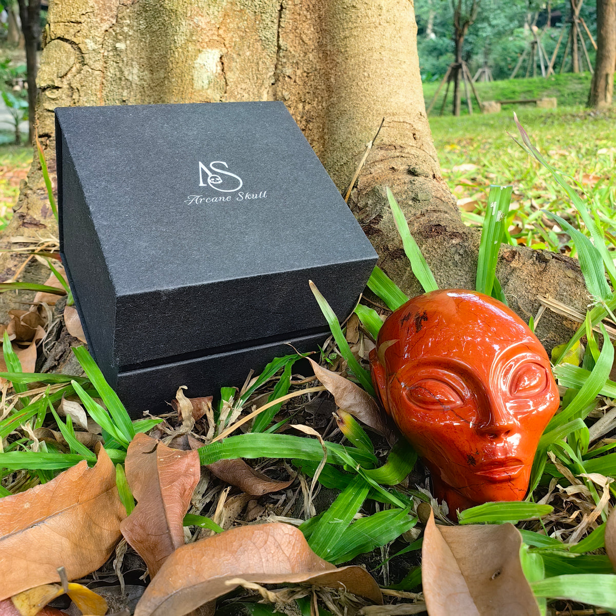 Additional view of a 3.8-inch Red Jasper alien skull carving