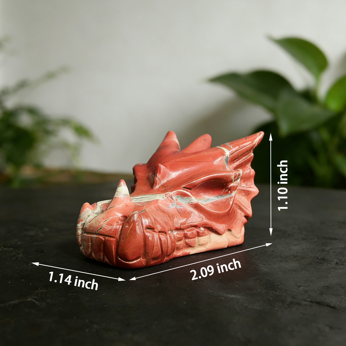 Additional view of a 2-inch Red Jasper dragon skull carving