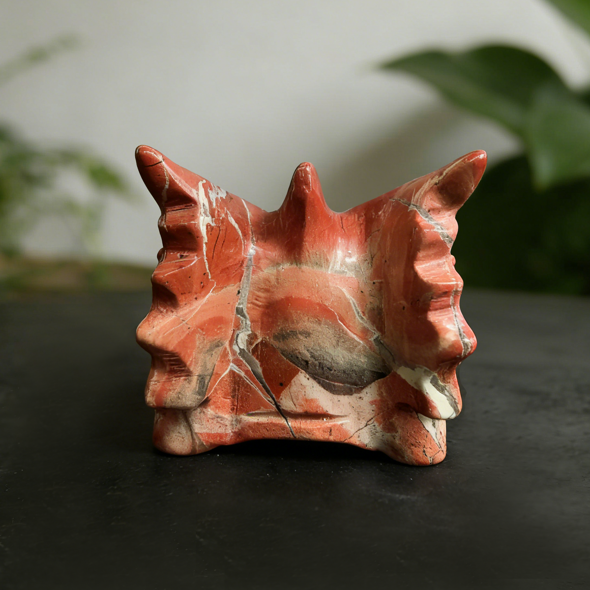 Additional view of a 2-inch Red Jasper dragon skull carving