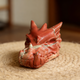 Additional view of a 3-inch Red Jasper dragon skull carving