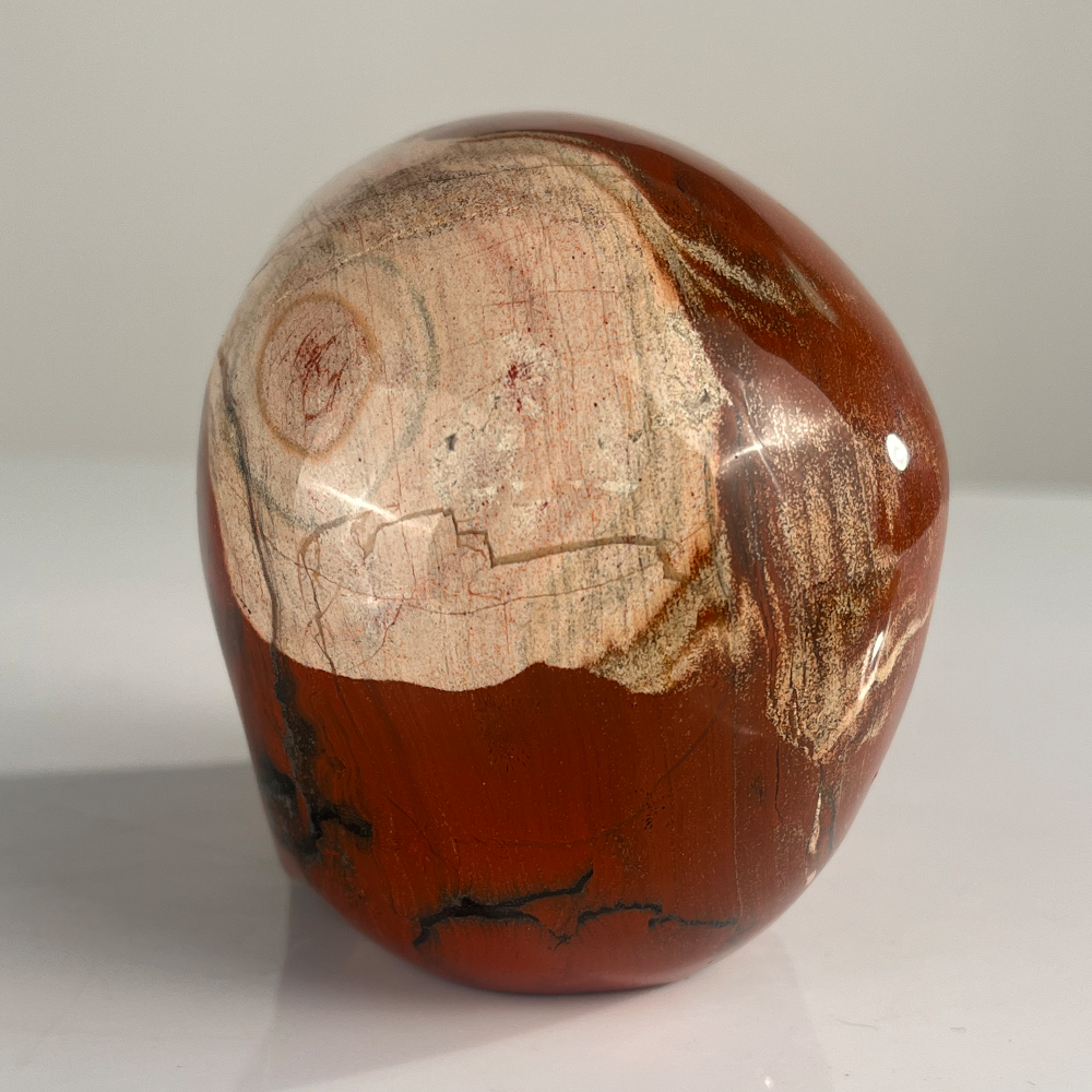 Back view of a 4.5-inch Red Jasper human skull carving