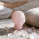 Additional view of a 3.8-inch Rose Quartz alien skull carving