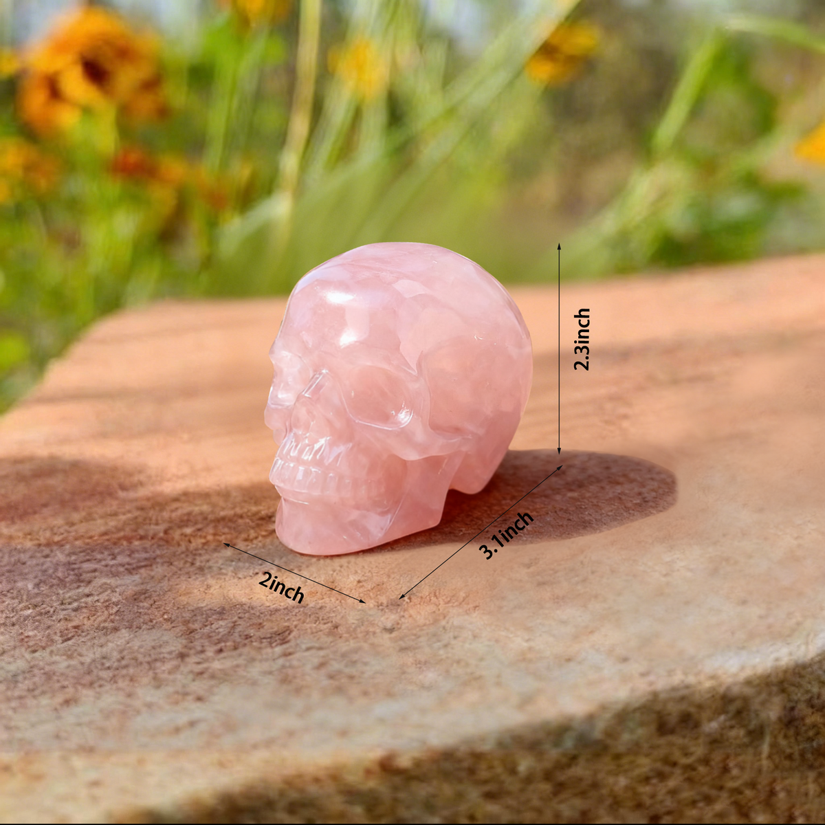 Additional view of a 3-inch Rose Quartz human skull carving