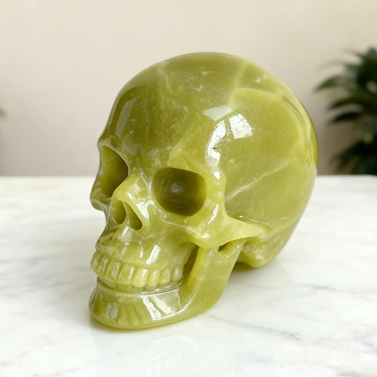 Additional view of a Serpentine human skull carving