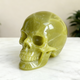 Additional view of a Serpentine human skull carving