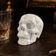 Main view of a 3-inch White Howlite human skull carving