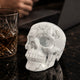 Main view of a 3-inch White Howlite human skull carving