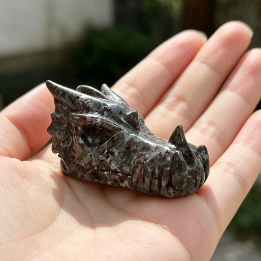 Additional view of a 2-inch Yooperlite dragon skull carving