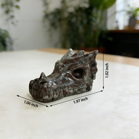 Additional view of a 2-inch Yooperlite dragon skull carving