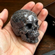 Additional view of a 2-inch Yooperlite human skull carving